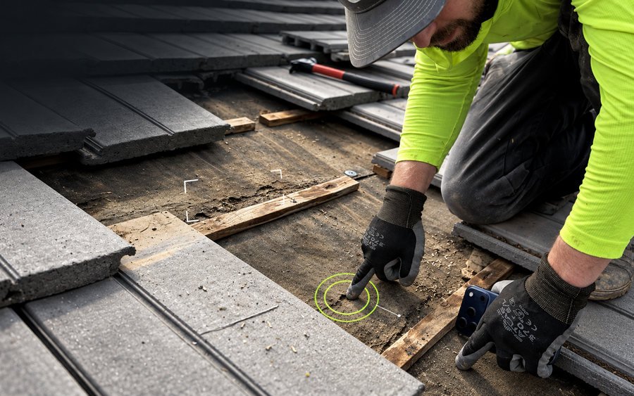 Roof tiles lifted to expose the battens and underlayment, with inspection callouts marking a fastener and a section of the deck